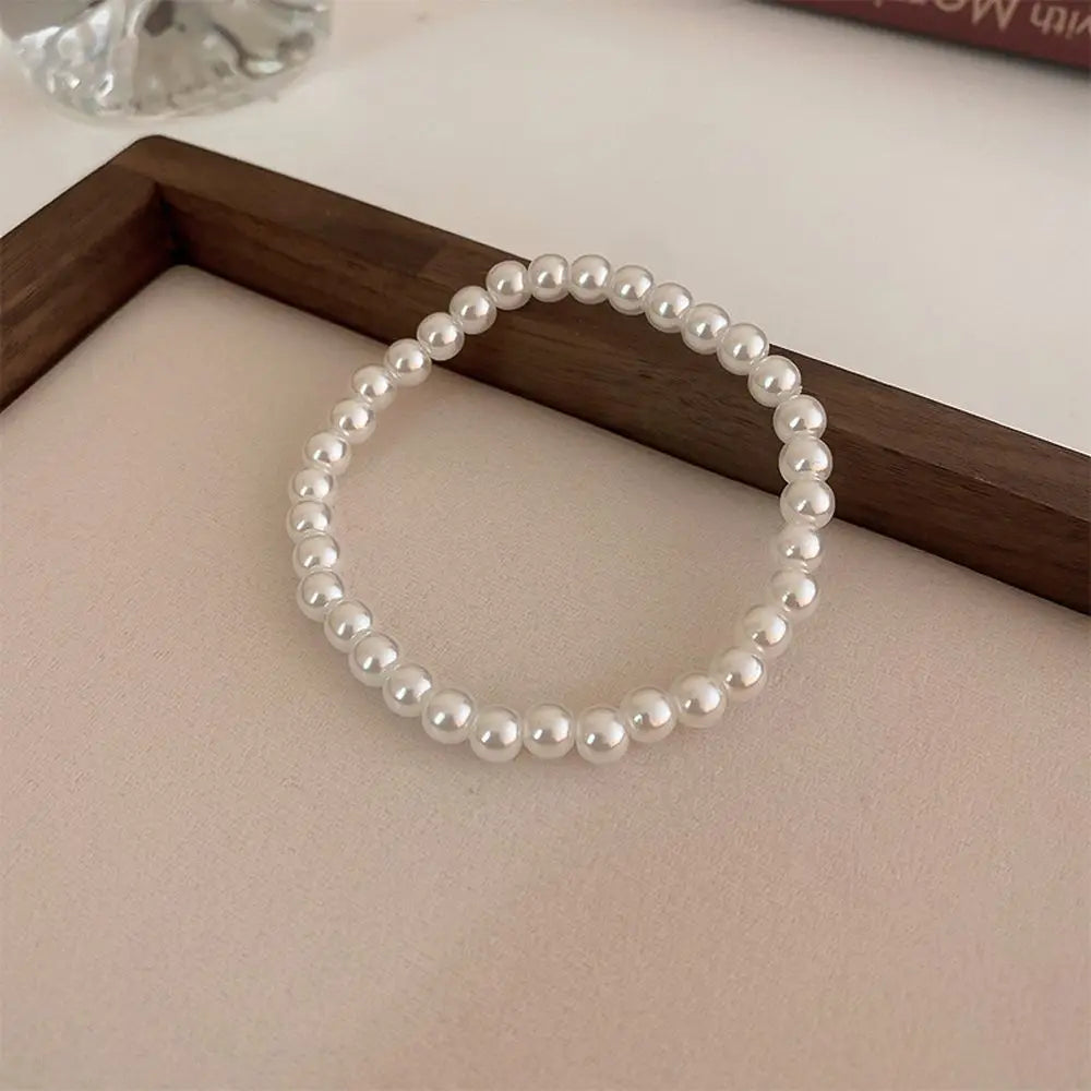 Korean Pearl Elastic Bracelet for Women – Elegant Fashion Jewelry Pearl Strand Bracelet PLUSH 6mm-B