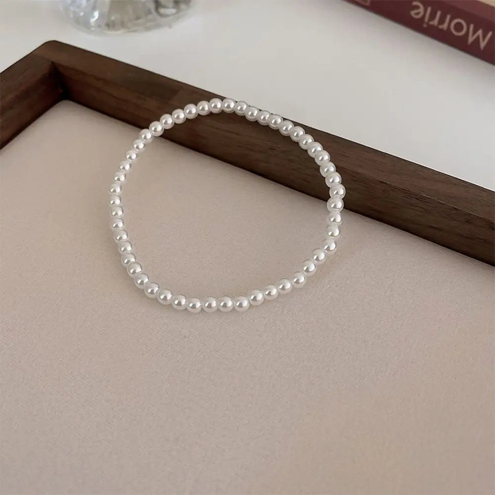 Korean Pearl Elastic Bracelet for Women – Elegant Fashion Jewelry Pearl Strand Bracelet PLUSH 4mm-A