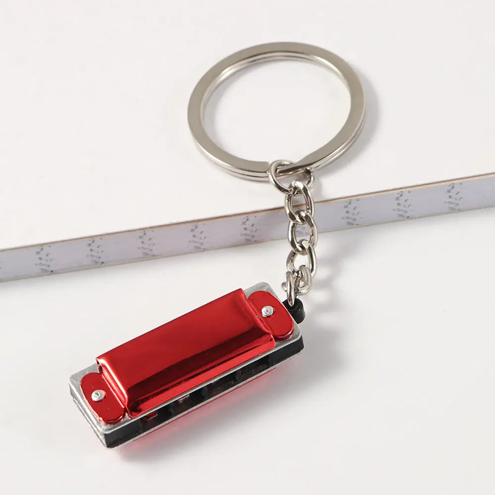Mini Harmonica Keychain – Playable 8-Tone Key Ring Pendant Novelty Keychain PLUSH red